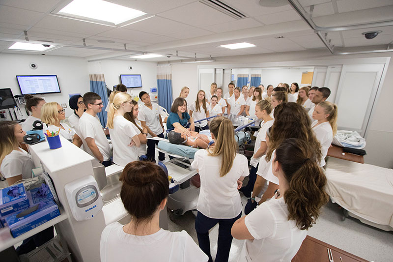 A group of students in the STEPS center simulation bay