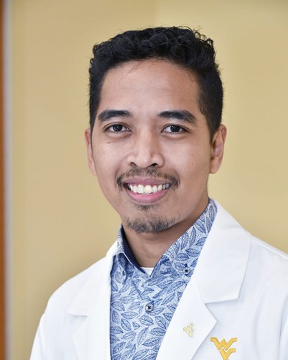 A head shot photo of Rudi Safarudin.